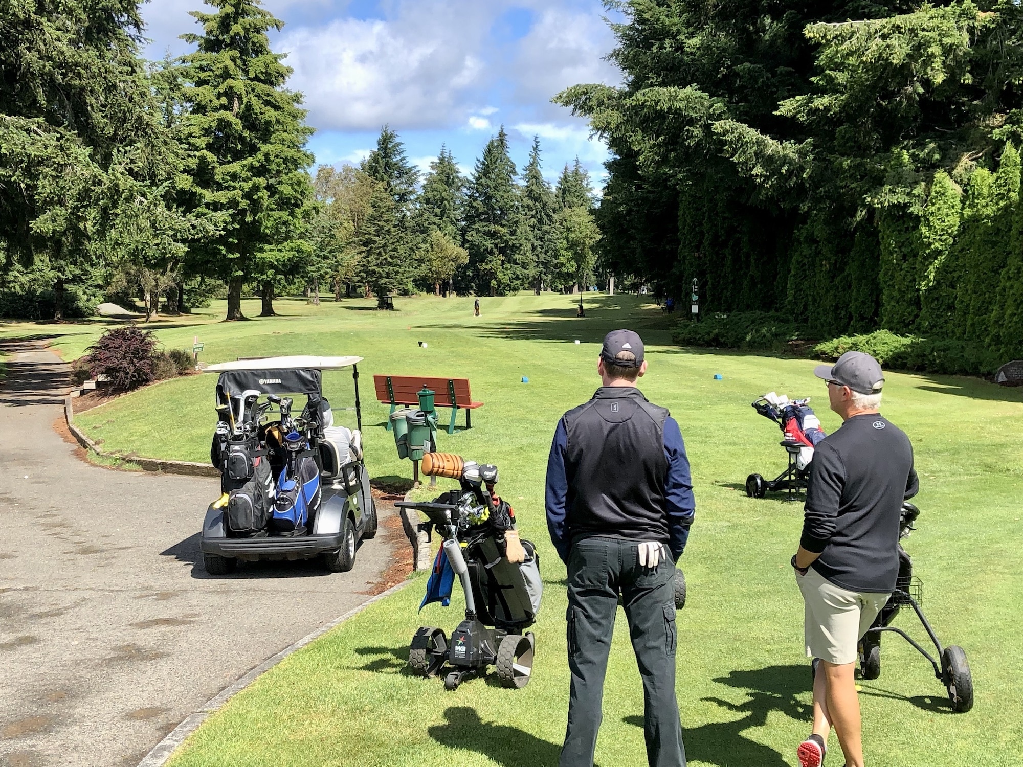 Golfers waiting to tee off at Madrona Links Golf Course.